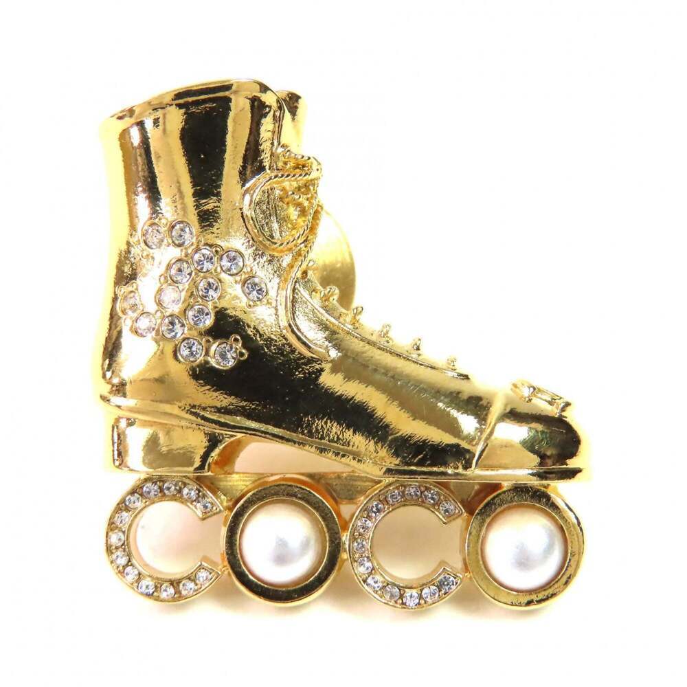 CHANEL Authentic Gold Pearl Logo Brooch